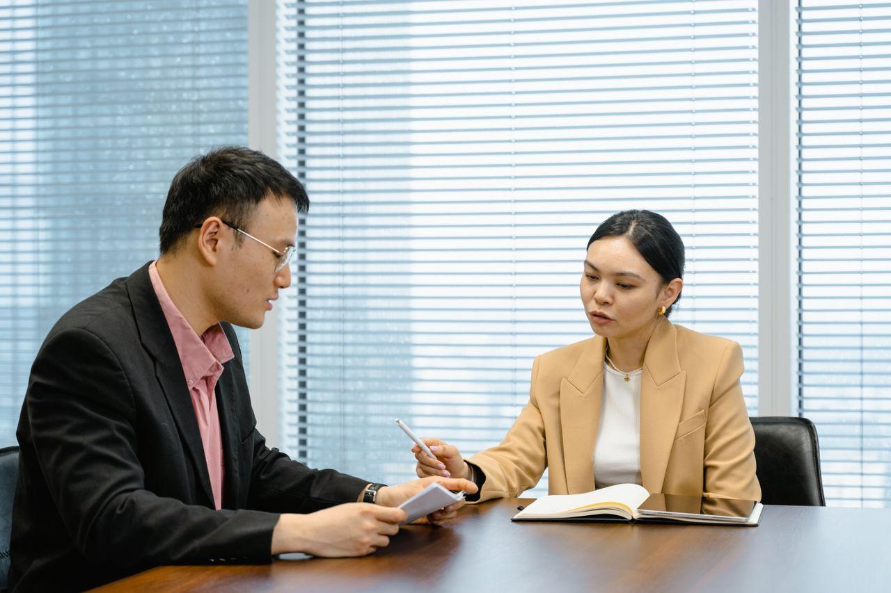 Commercial consulting team reviewing a client engagement